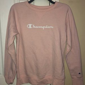 It’s a light pink champion sweatshirt